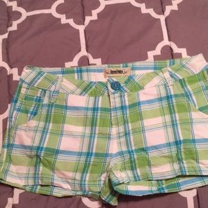 Blue, green, white shorts.